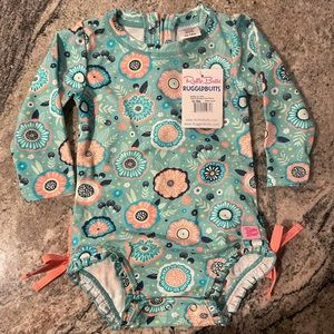 Toddler/infant Girls Ruffle Butts Island Dream 12-18 month swim suit. NWT